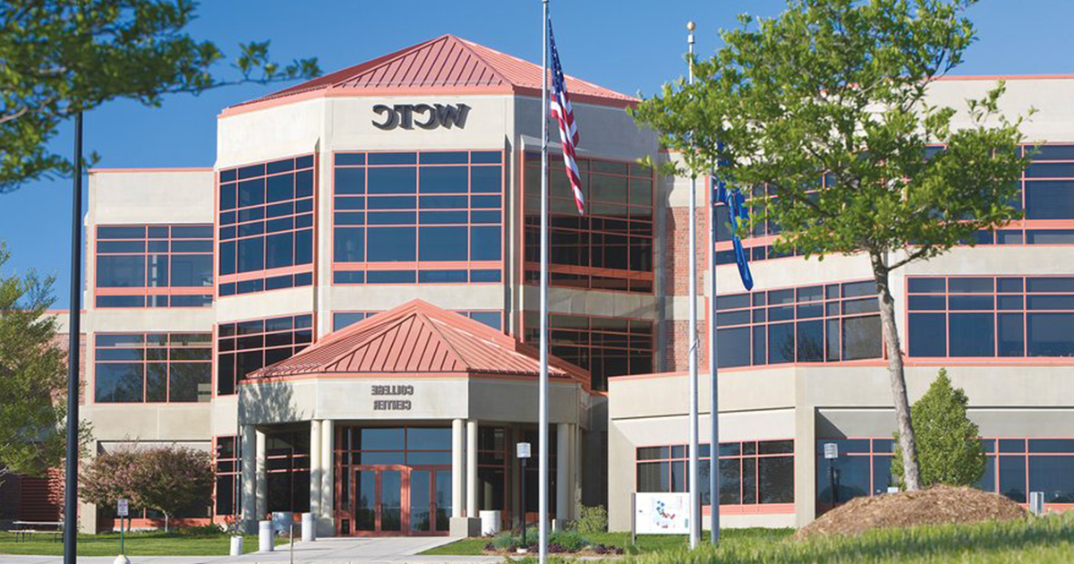 Wide shot photo of WCTC main building outside in sun